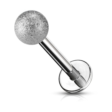 Labret neet teemantilise tolmu säraga.