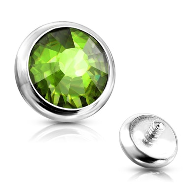 Dermal anchor kinnitus erinevat tooni kivikestega.