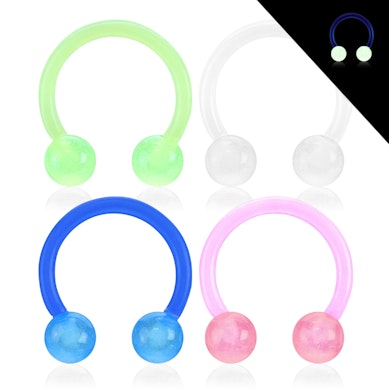 Pimedas helendav akrüülist hobuseraua kujuline neet