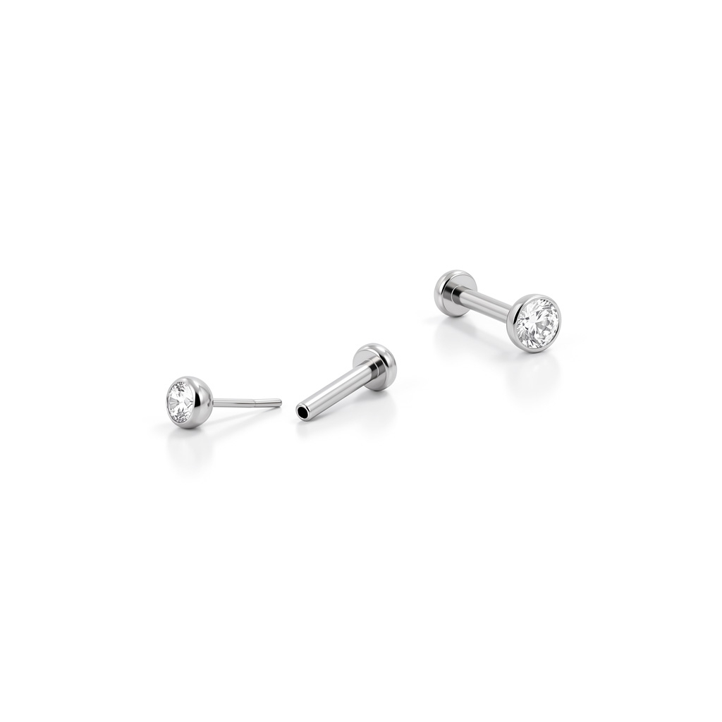 Push-in labret titaanist ja metallraamis kivikesega