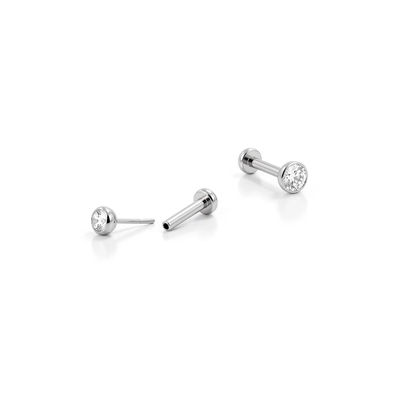 Push-in labret titaanist ja metallraamis kivikesega