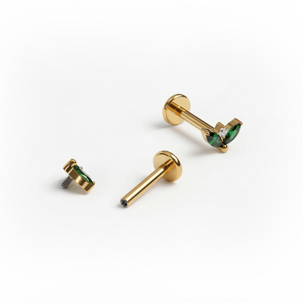 Titaanist labret smaragdist kivide paariga