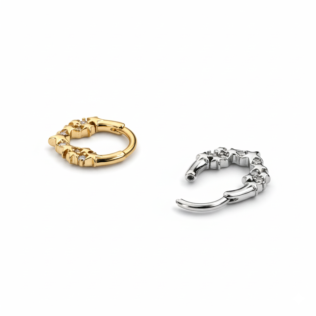 Rõngas tähtede ja kivikestega